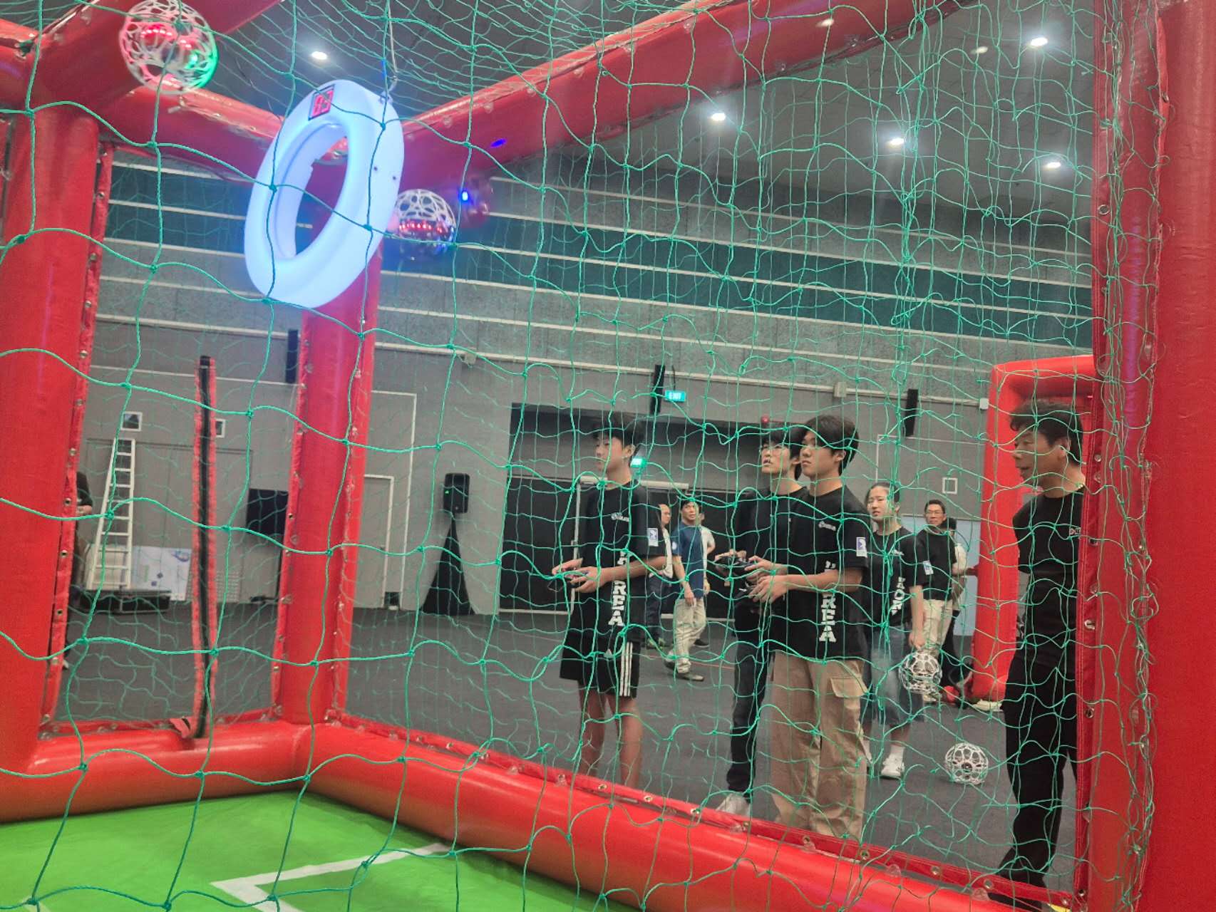 Teams conduct pre-match flight checks and practice runs before the official start.